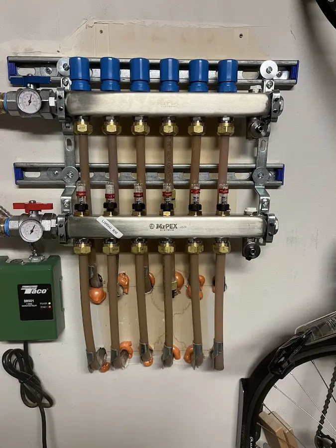 Plumber performing Water Heater Repair at a residential property in The Pinery